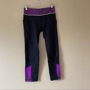 Black lululemon leggings with purple detailing